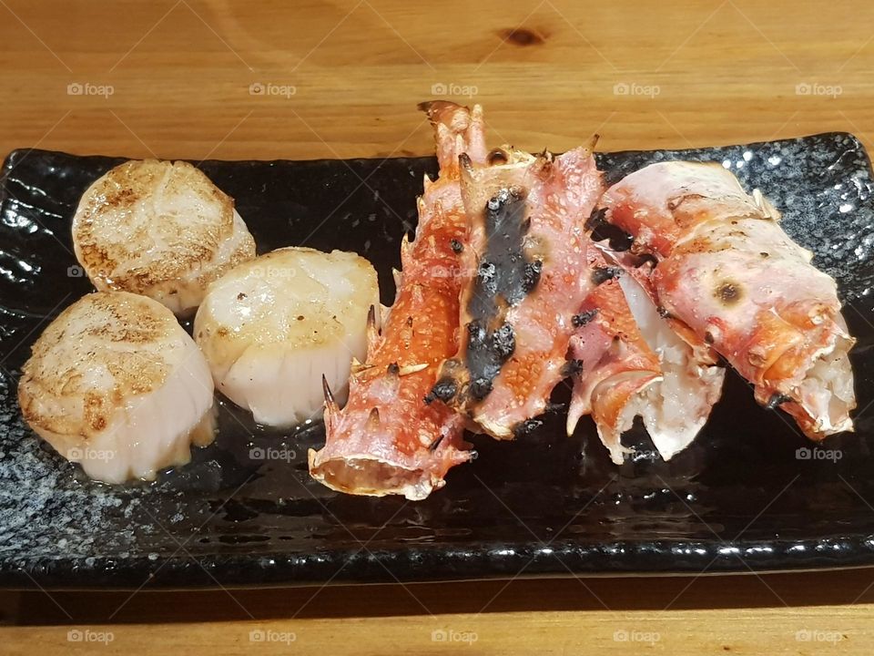 Delicious sea food crab and scallops dishes