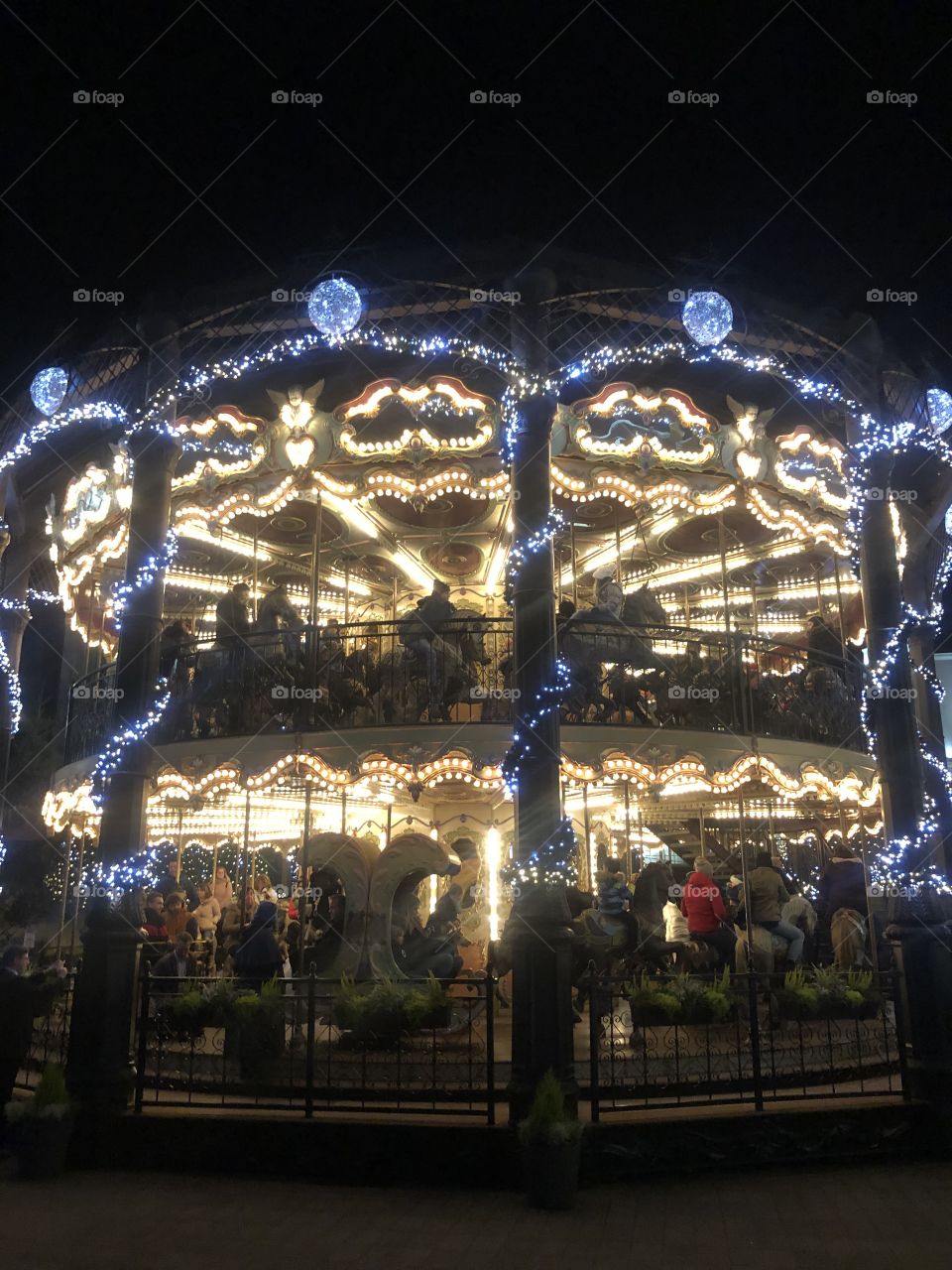 carousel decorated with festive lights 