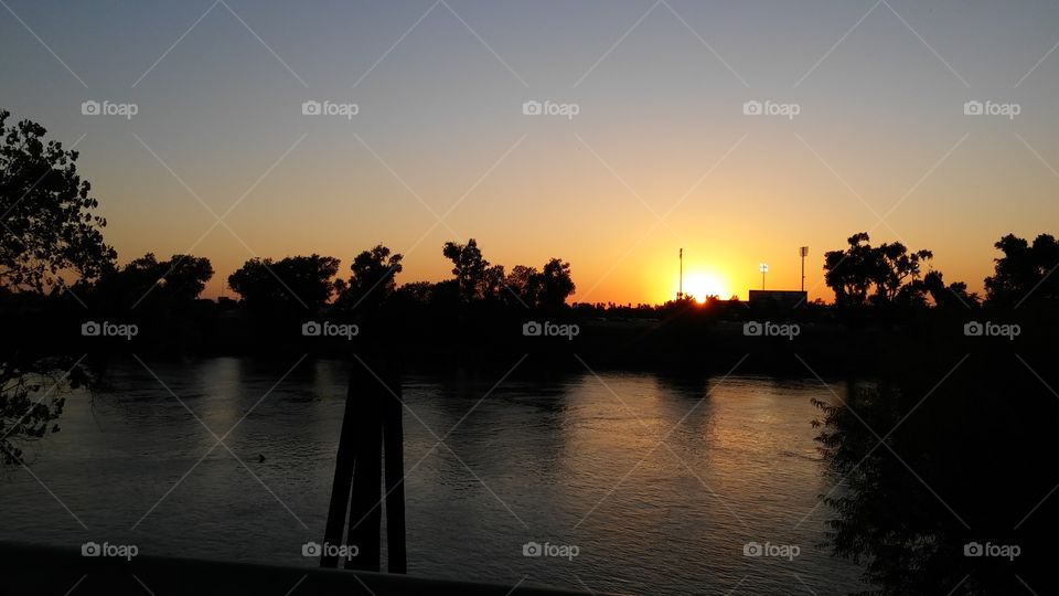 Sunset over Raley Field and the Sacramento River