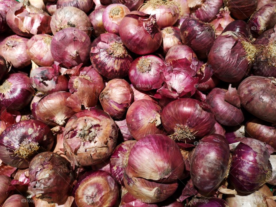 Close-up of many shallots.