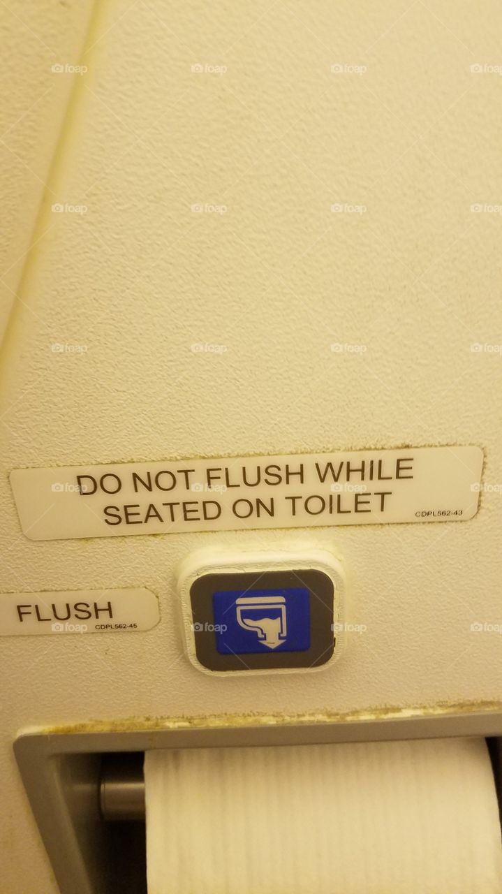 Do Not Flush Toilet on Airplane Sign