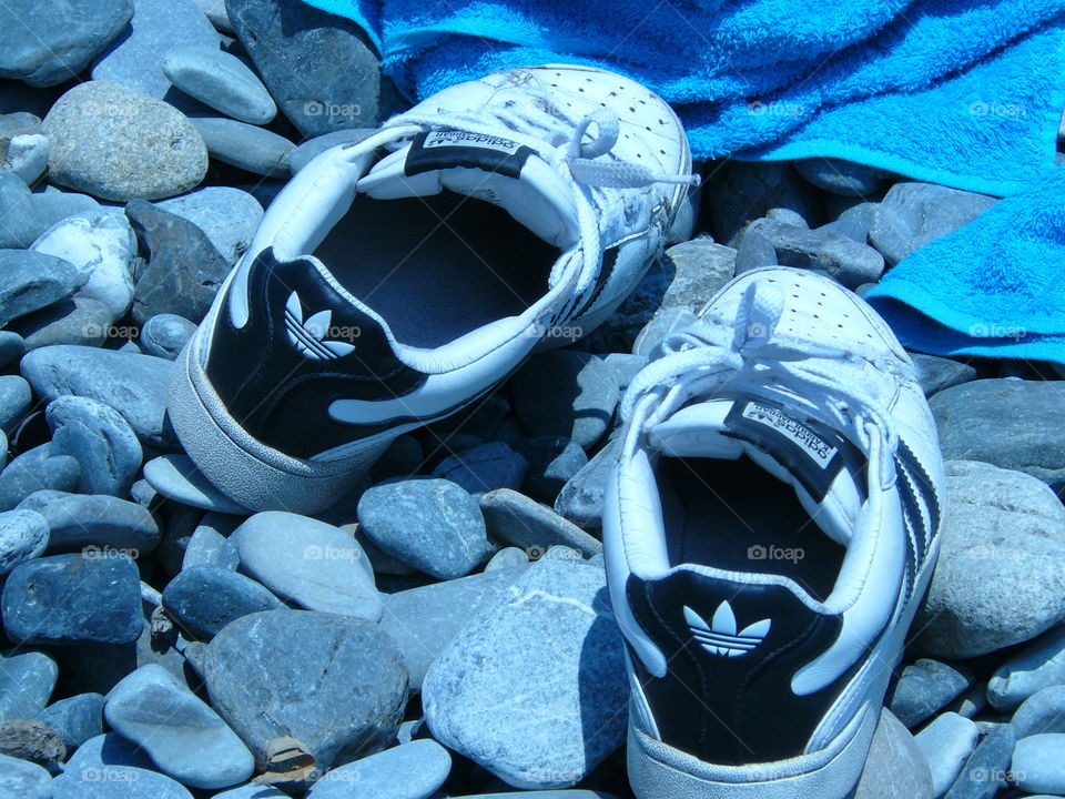 sneakers on the stones