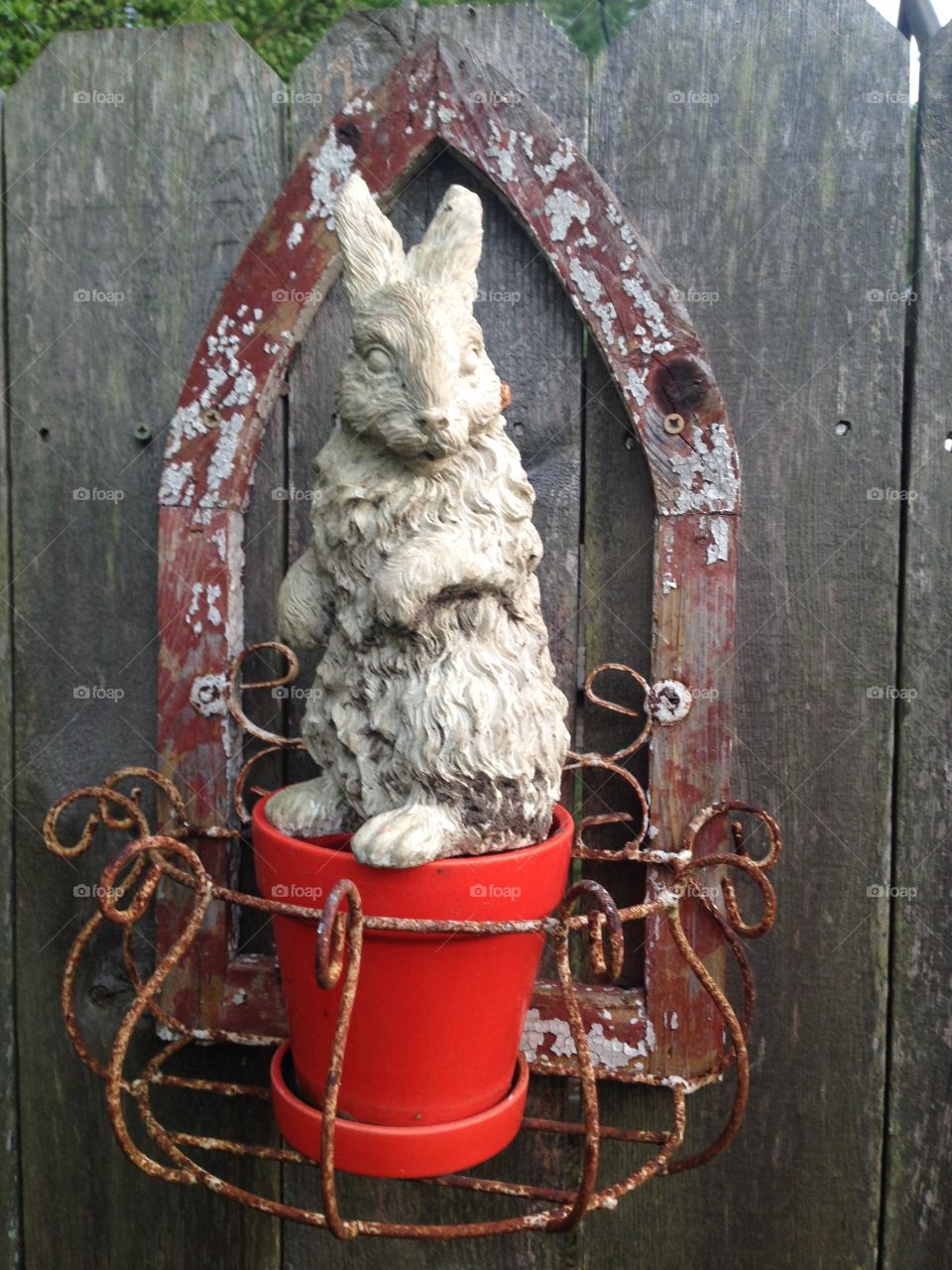 Bunny statue  standing guard in the garden