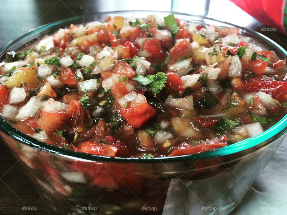 Fresh veggies in pico can be used as salad dressing, topping for meat dishes and just as a side!