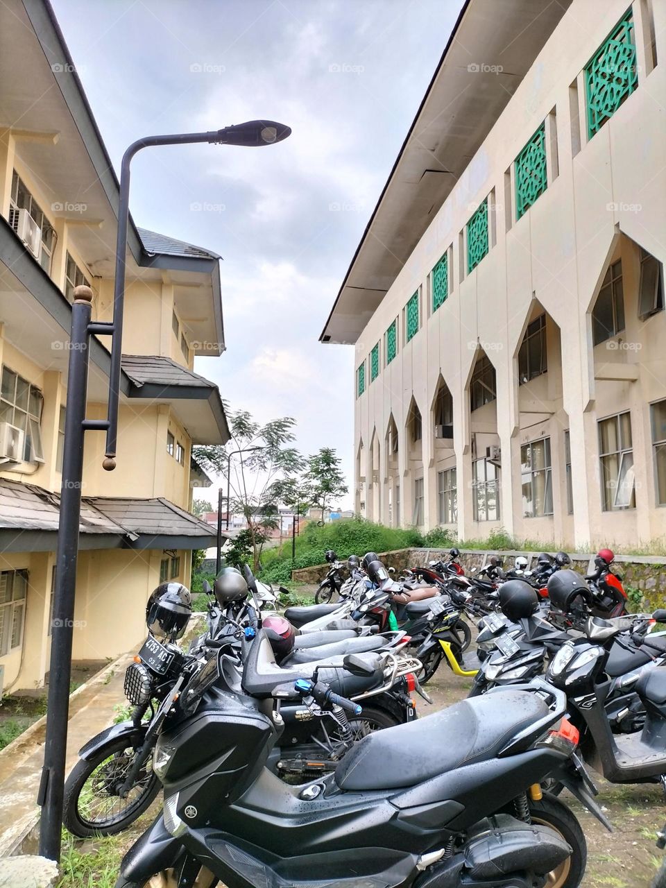 motorcycle parking on campus for background