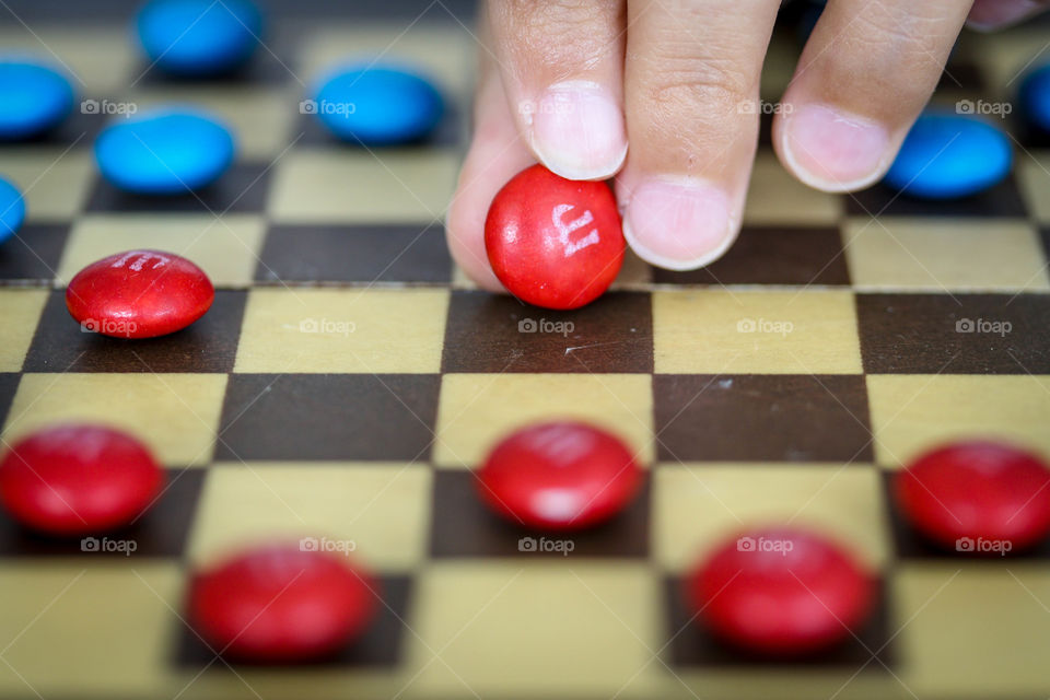 Playing checkers using M&Ms chocolates