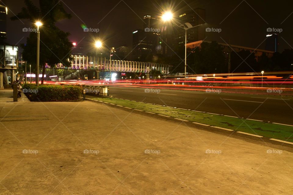 Long exposure photo: Streets in Jakarta City at night.