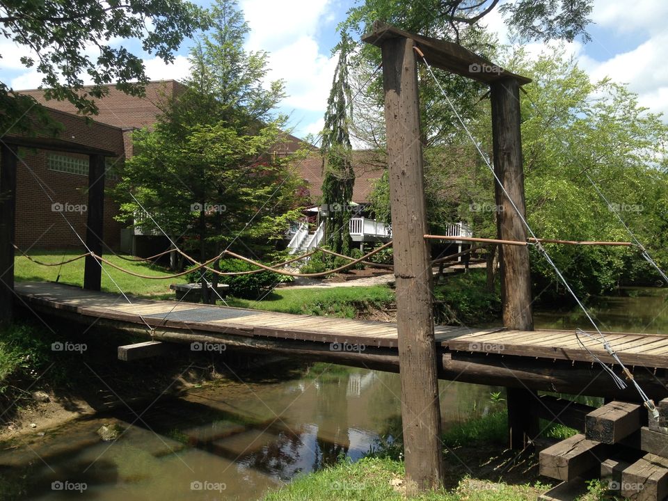 Wooden bridge. Wooden bridge over stream behind Rec center