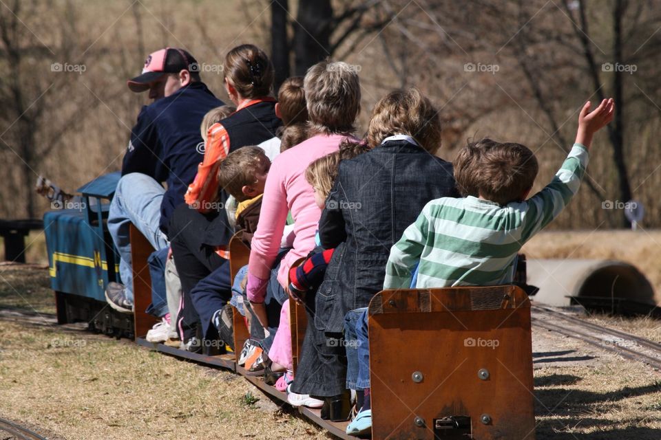 Model train ride through the park
