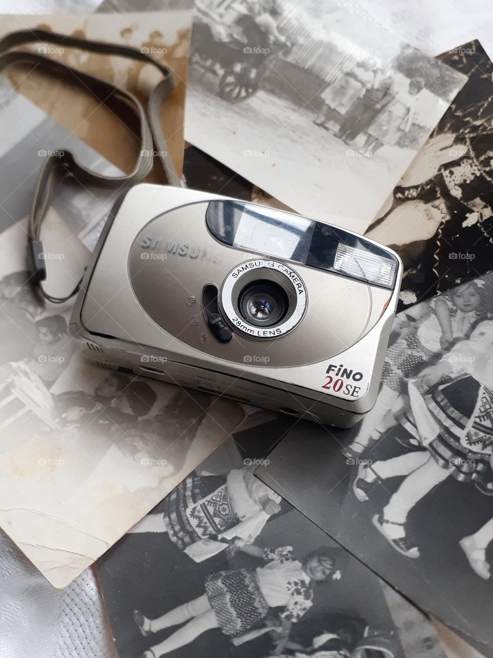 retro film camera from the 2000s with old photos