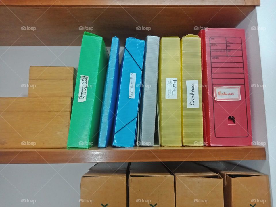 Plastic files on a shelf