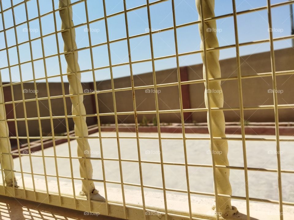 School yard.  Photo behind the window