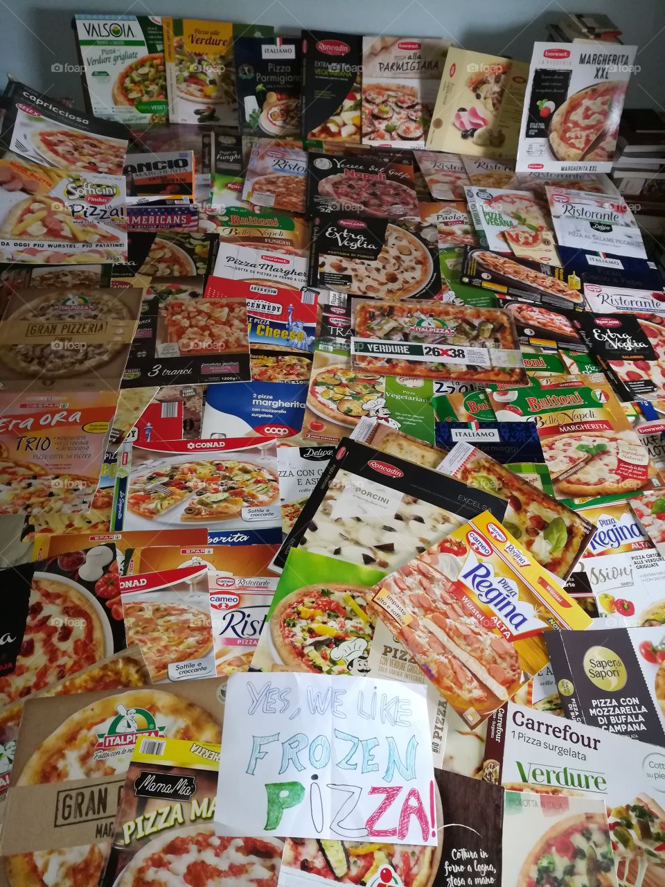 My collection: more than 100 frozen pizza cartons. Yes, we like frozen pizza! (vertical version)