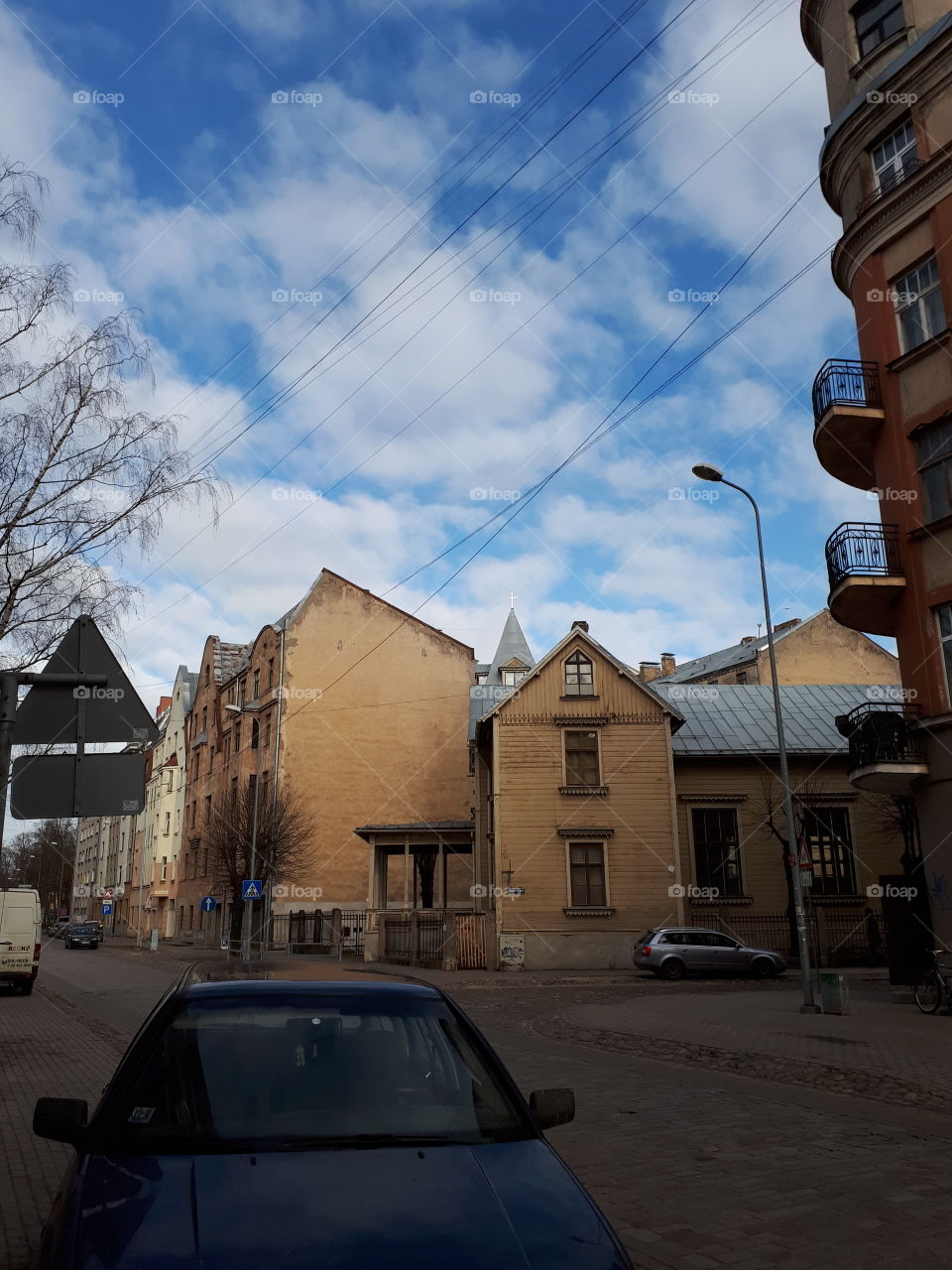 Street photography, old church, blue sky