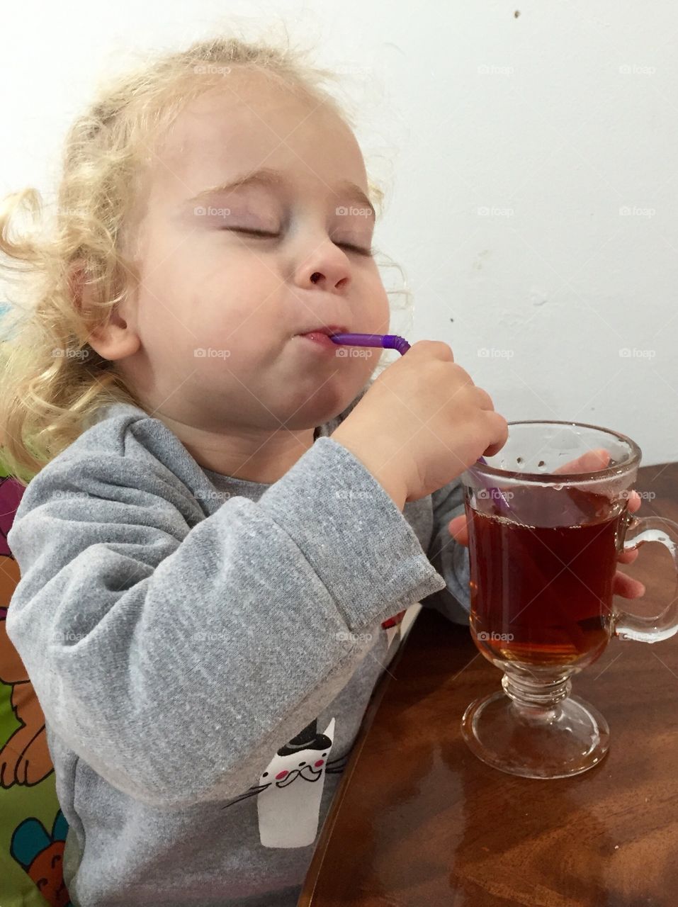 Toddler drinking tea