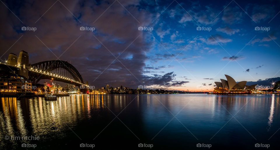 Wall of cloud at dawn over Sydney Harbour 