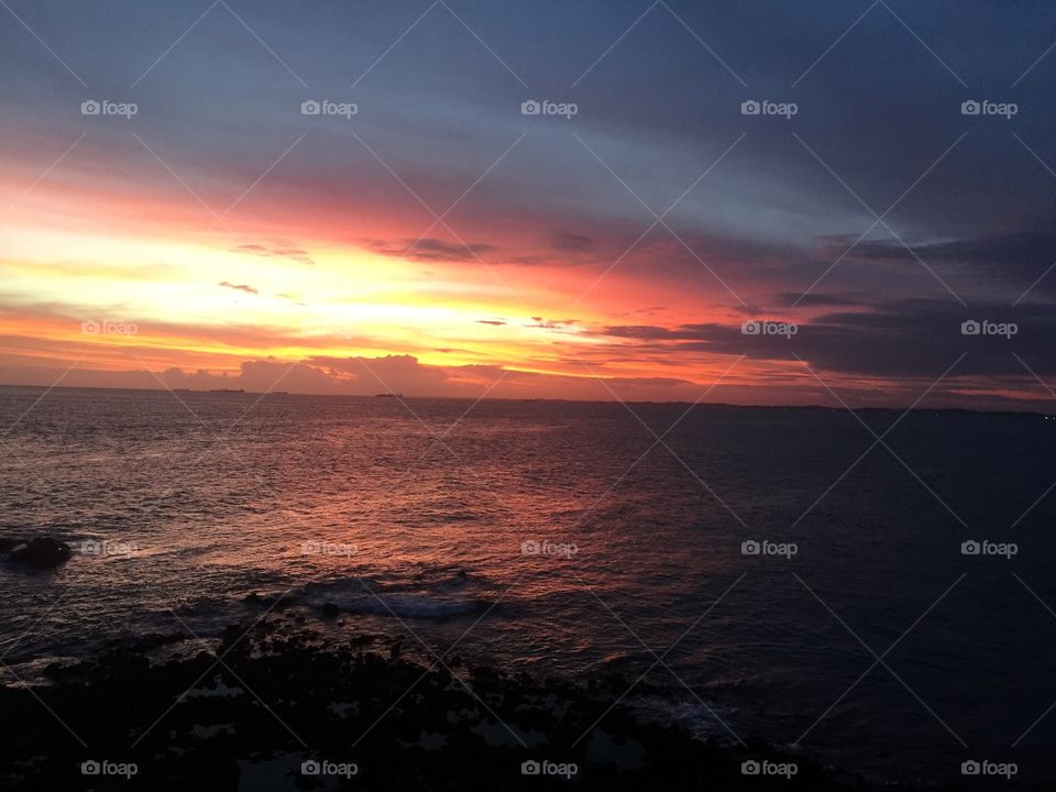 Dramatic sky over calm sea