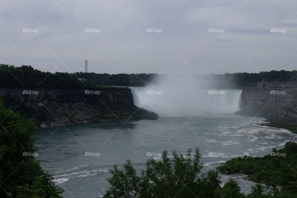 View of Horseshoe Falls (Canadian Falls) from Niagara Falls, ON.  Niagara River in foreground.
