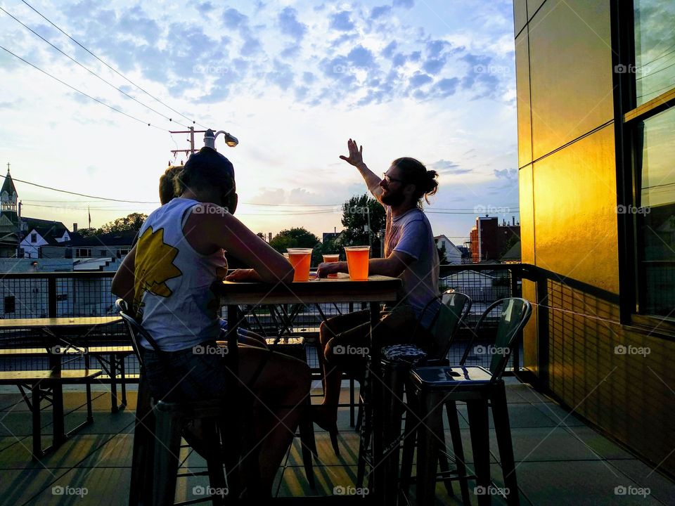 beers and good conversation at sunset