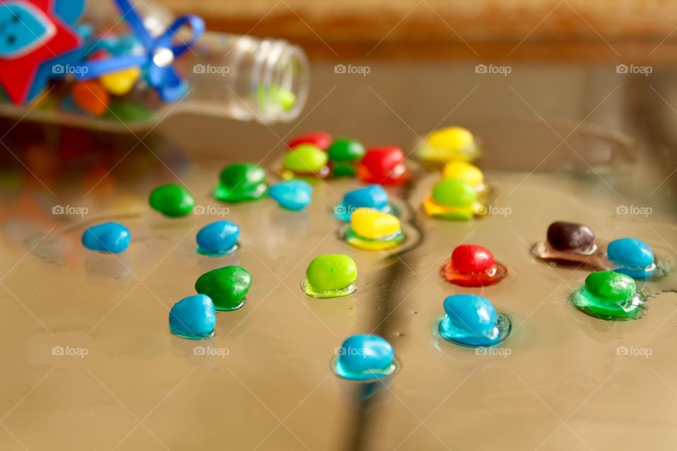 m & m on the glass table