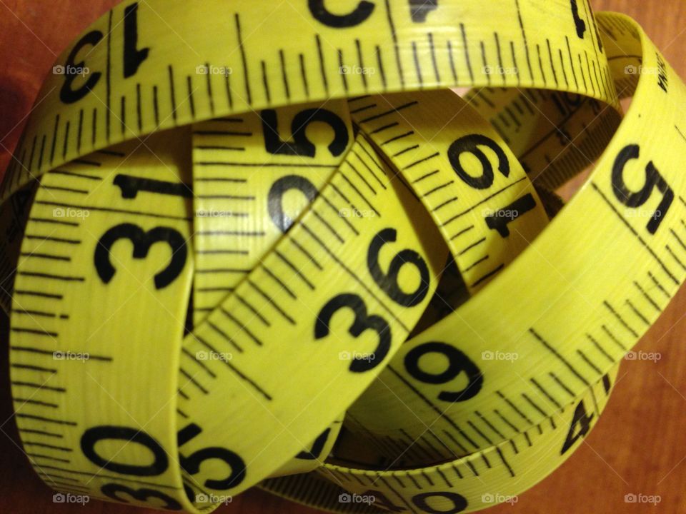 Take measure. Flexible tape measure