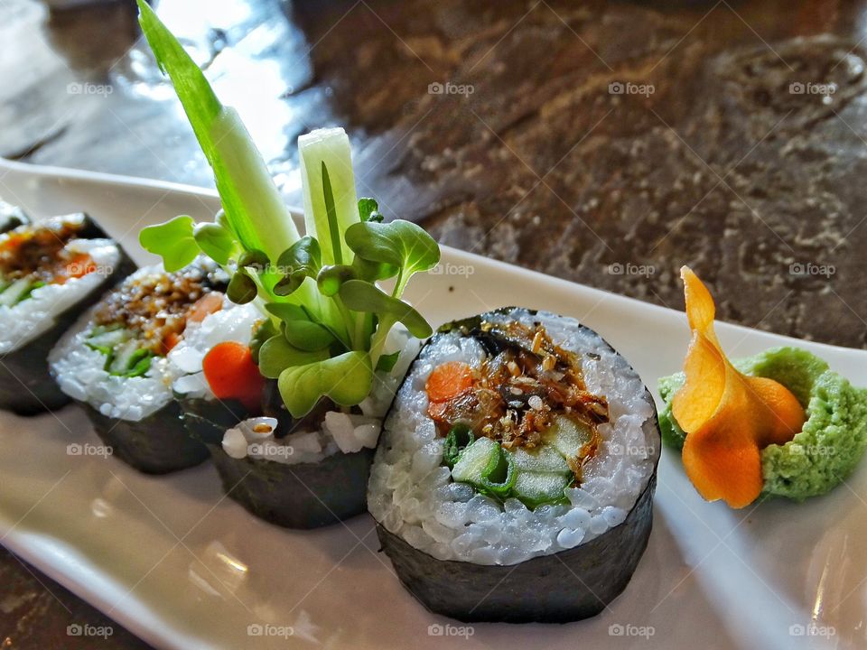 Gourmet Sushi. Fancy Salmon Sushi Roll With Green Onions
