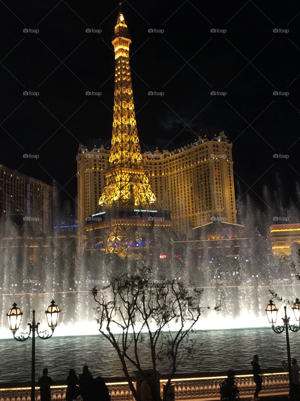 Fountains of the Bellagio in front of the Las Vegas Eiffel Tower