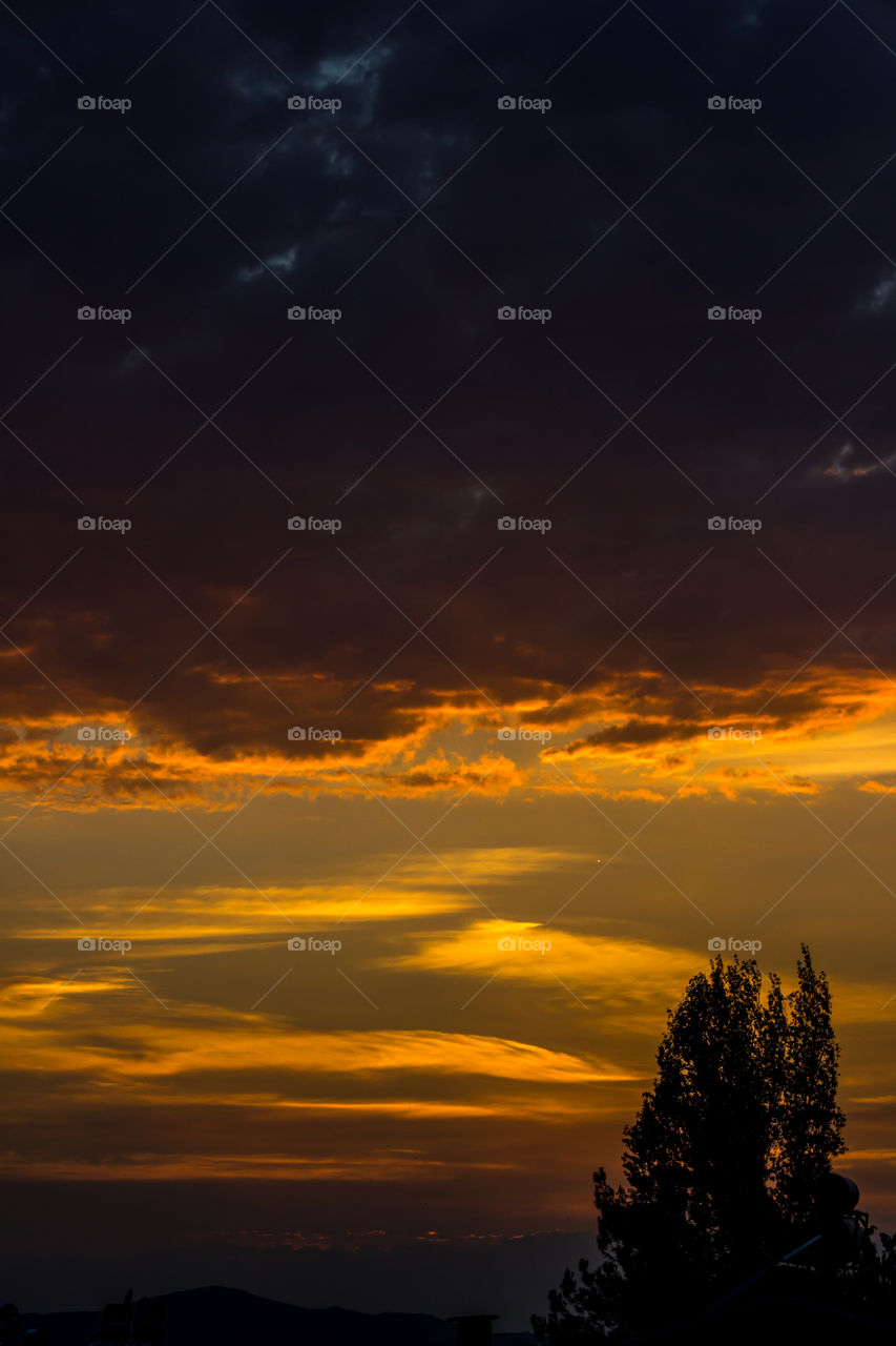 Scenic view of golden sky at sunset