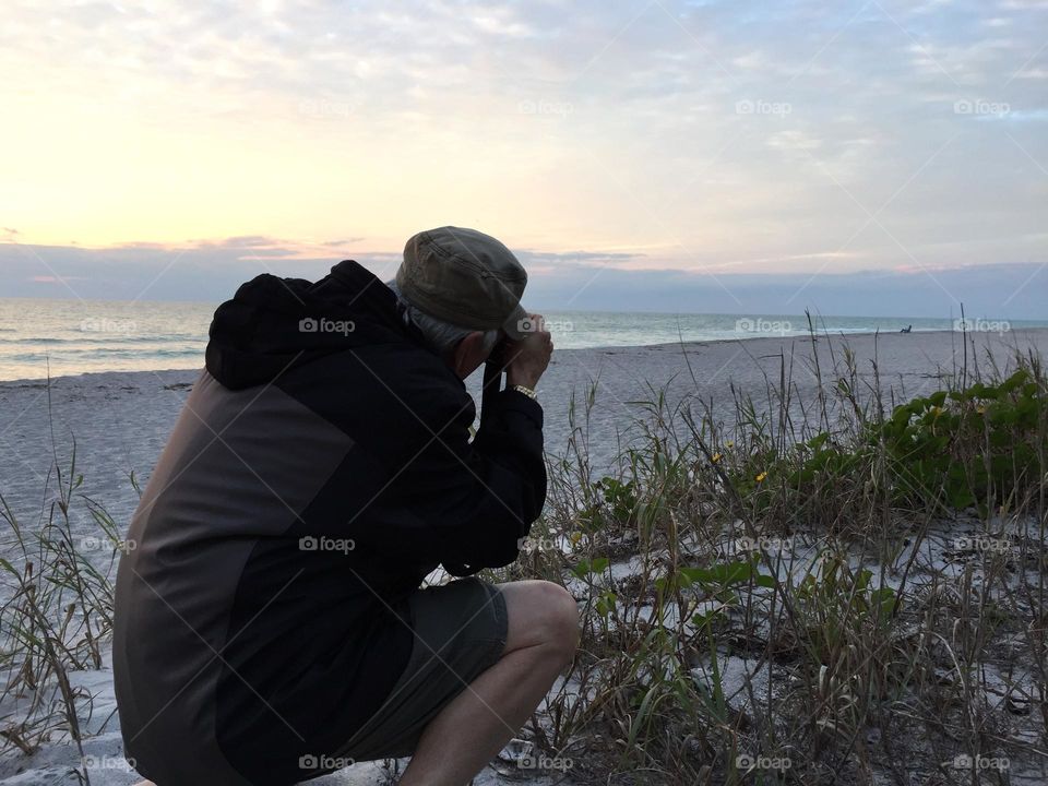 Photographer on the beach.