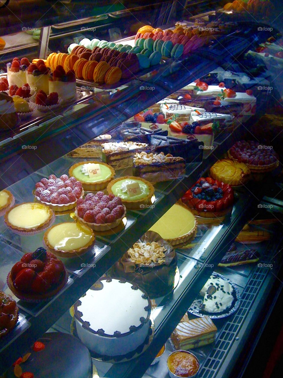 Decadent delight. Glass case filled with lovely and decadent sweet treats in New York City