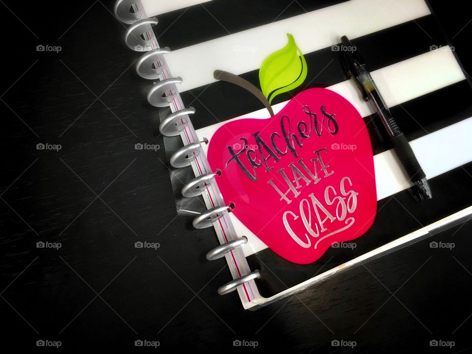 Teacher planner on black background 