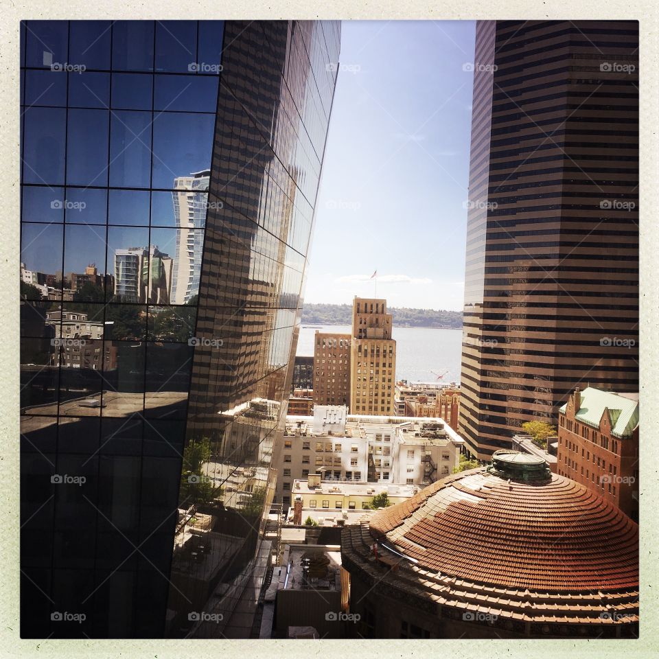 Review of Puget sound from the window of an office building downtown