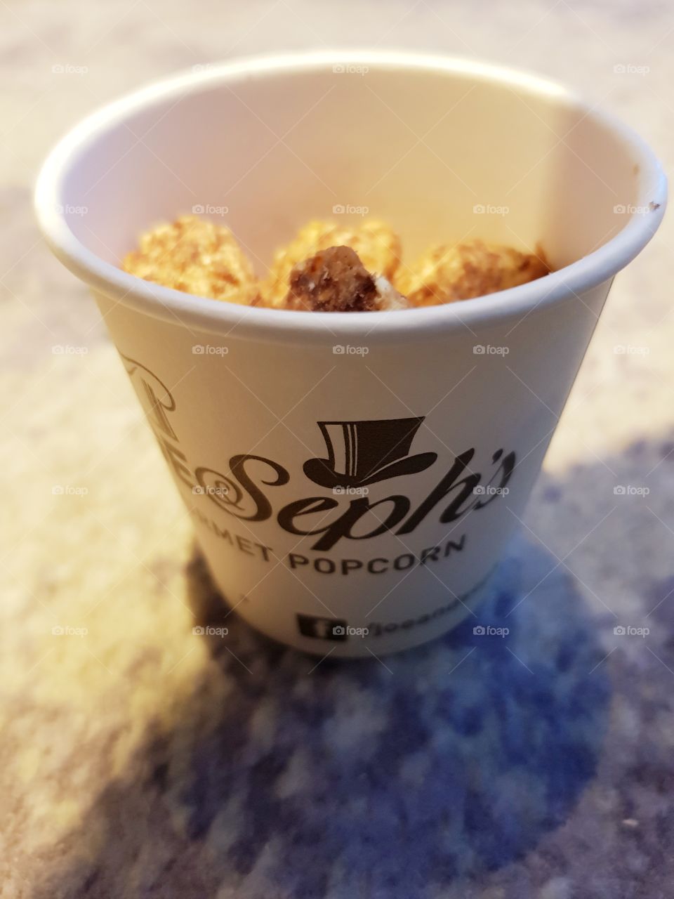 JoeandSephs cookies and cream popcorn handmade air popped gourmet snacks in a paper cup