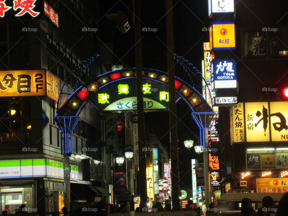 Shinjuku, Tokyo, Japan. Neon Lights Street Entrance Sign, Night View of City. Sakura Dori.