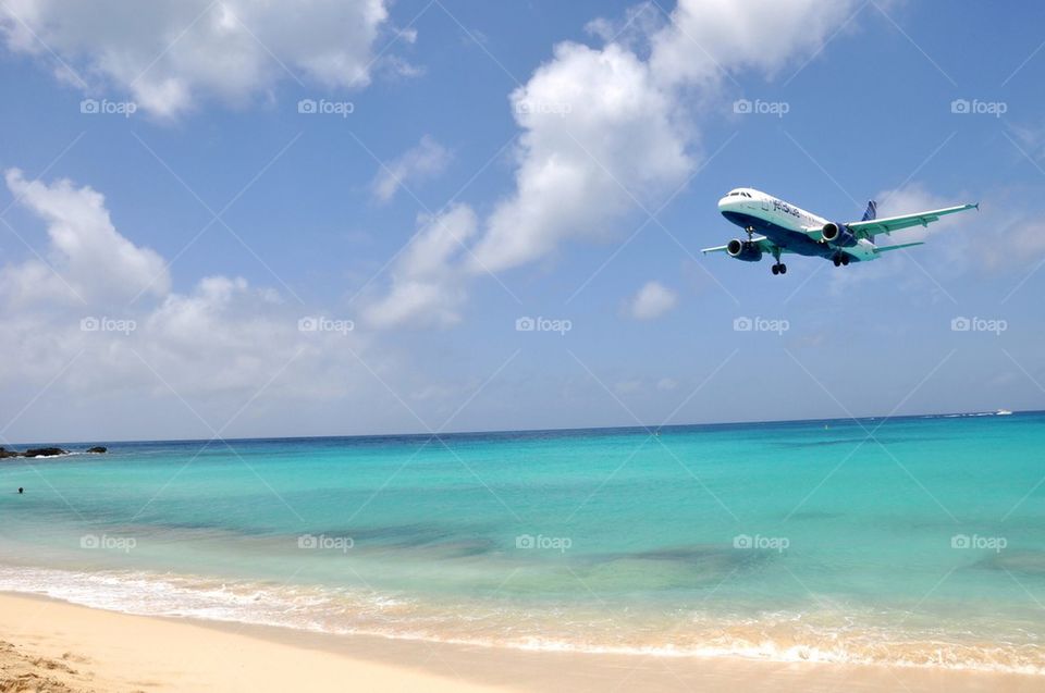 Plane landing on beach