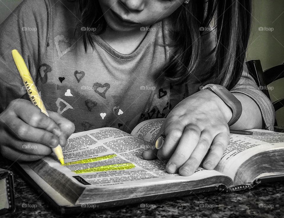 Highlighting in bible study children studying verses