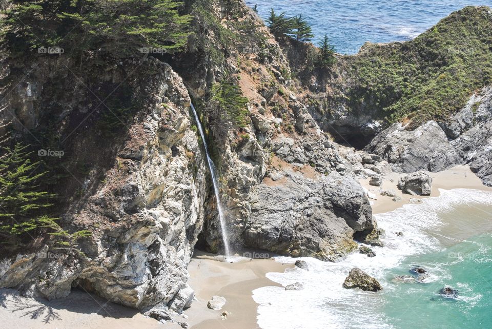 Waterfall Between Rocks