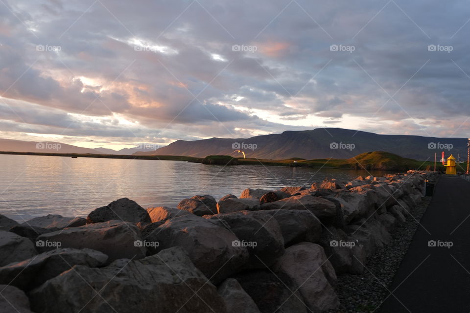 As the sun sets across the water you appreciate all that God provides for us to enjoy.   Grateful to be able to appreciate the simple things, like the sun setting on another day.