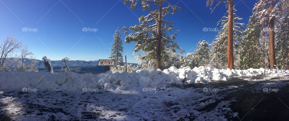 Snow in panorama view and blue sky