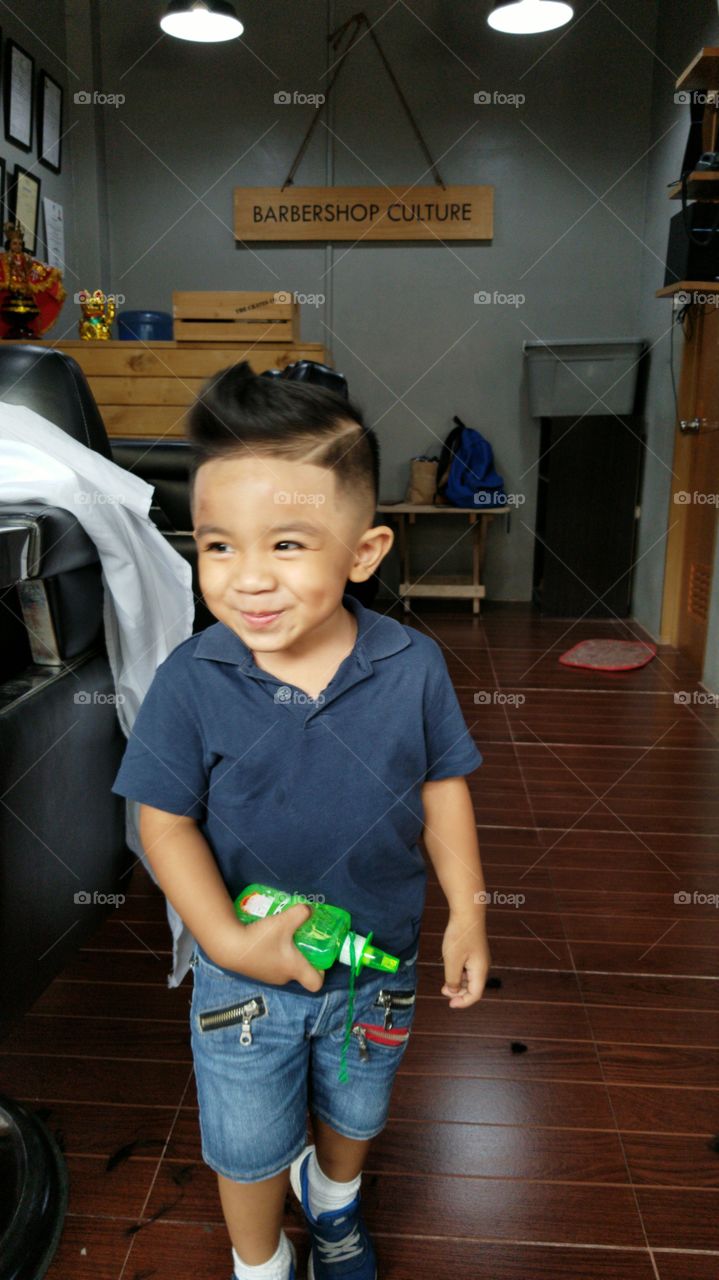 happy with his new haircut