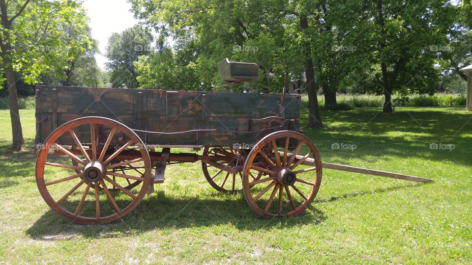 this is a one of a kind historic antique horse drawn international Weber corn hauling wagon.