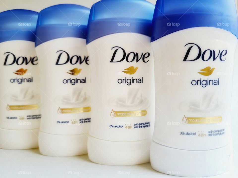 close-up of deostick Dove in a row