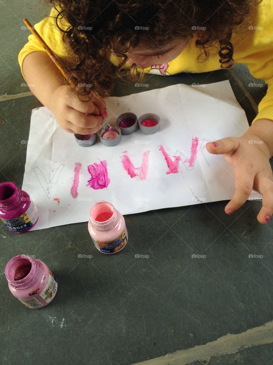 How to teach a girl to write her name