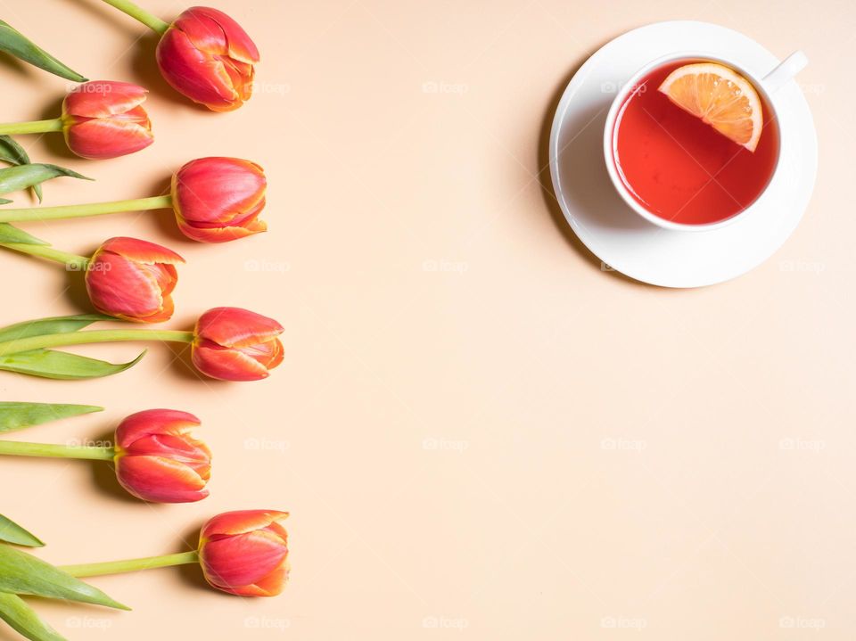 A cup of tea and tulips 