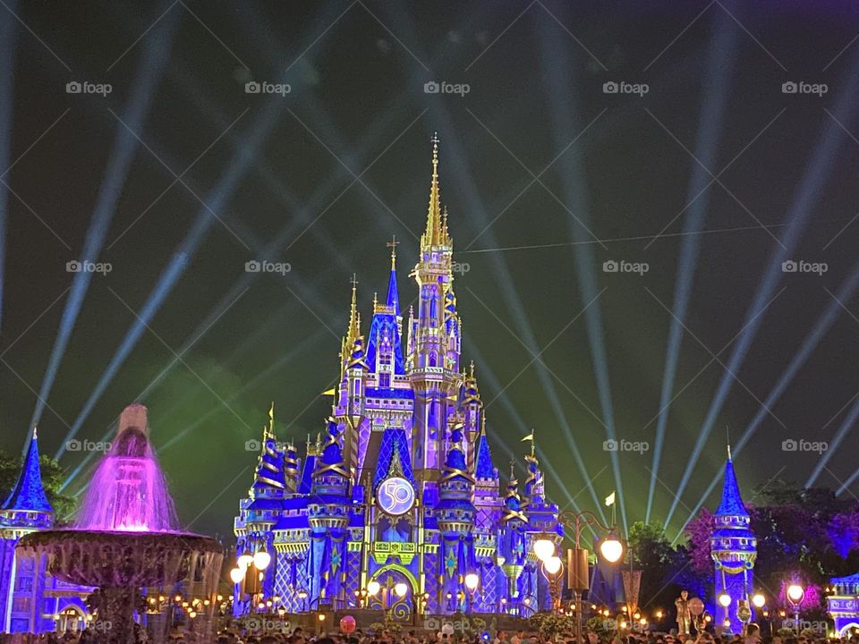 Cinderella’s castle looks magical as it’s lit up after the fireworks/light show at Walt Disney World’s Magic Kingdom