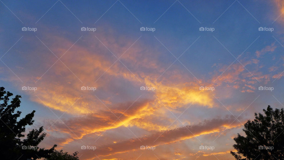 Cloudy sunset. Scenic sunset outdoors cloudy
