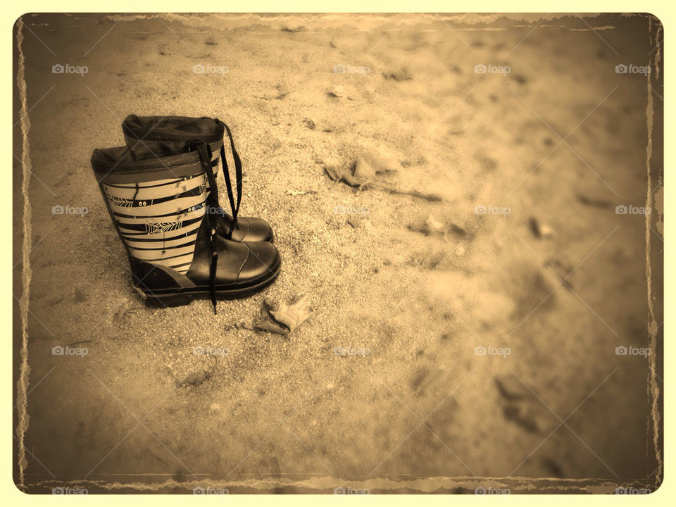 BOOTS IN SAND