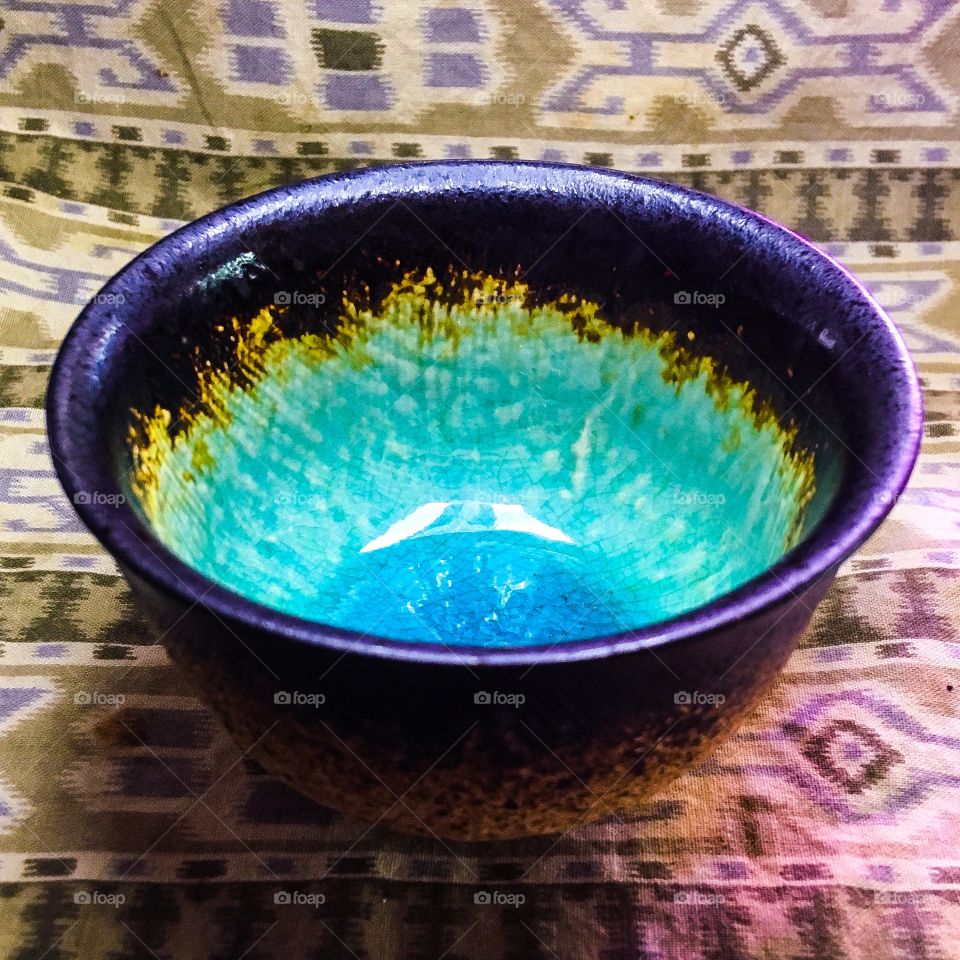 A small cup with so much detail and color, for only 99¢ at a thrift store.