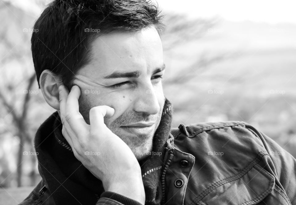 Close-up of a handsome beard man wearing jacket