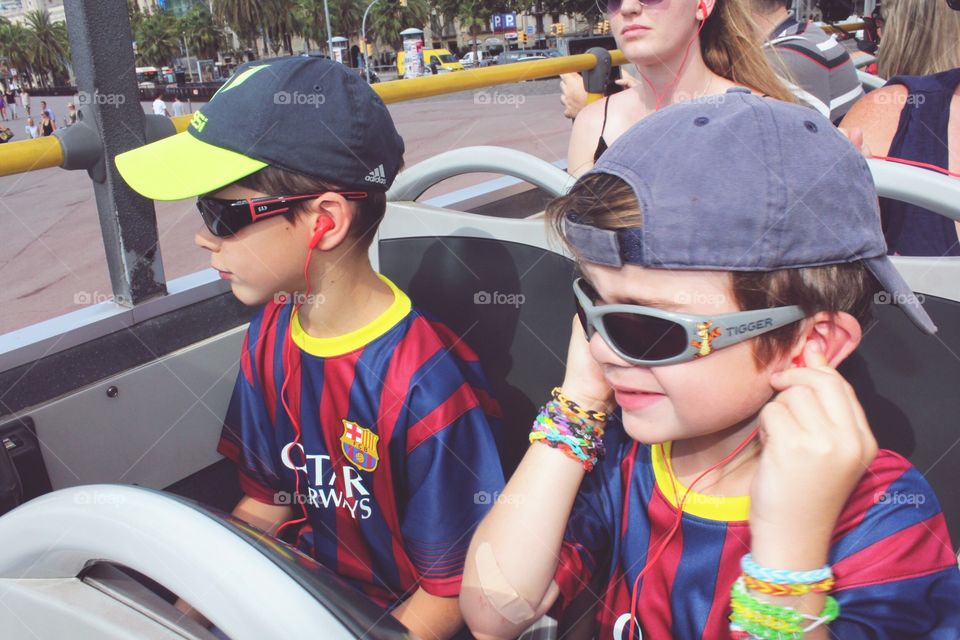 Boys in a city bus tour